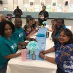 Table of ReIGNITE Church Volunteers